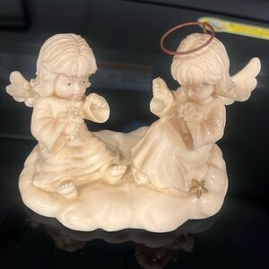 Collection Heavenly Angels
She Loves Me She Loves Me Not. One is missing a halo